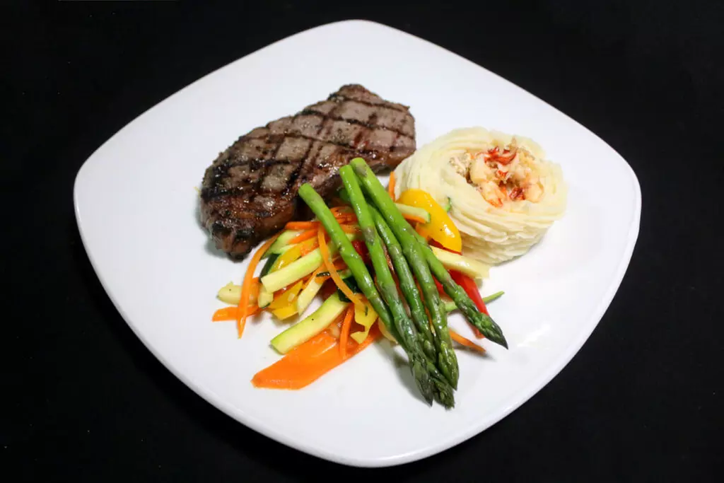 Up to 44% Off on Four Course Meal for Two or Four Dine In at Wildfire Grillhouse - Primary Image