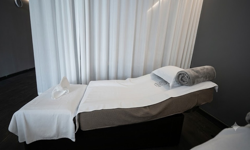 Image 3: Relaxing Foot and Body Massage with Hot Stones and Essential Oils


