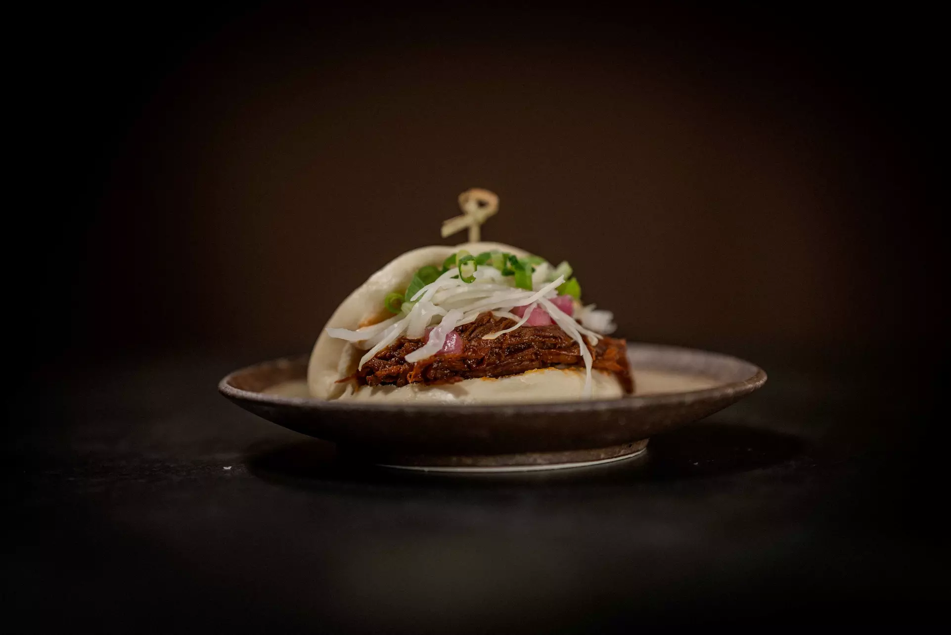 Savor Bao Buns, Sides, and Drinks for up to Four!