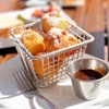 Image 1: Enjoy a sandwich, coffee, and beignets at The Nest Cafe
