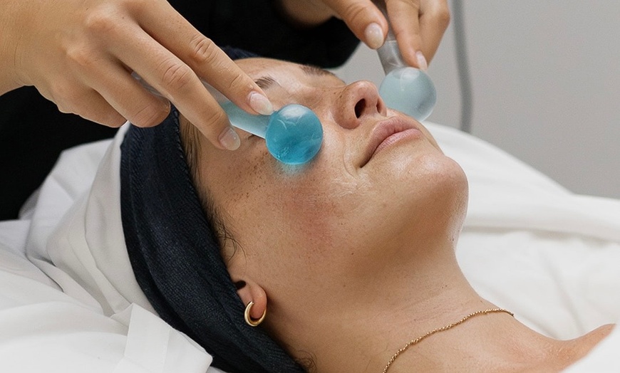Image 1: Glow Up with One Full Custom Organic Vegan Facial with LED Red Light 