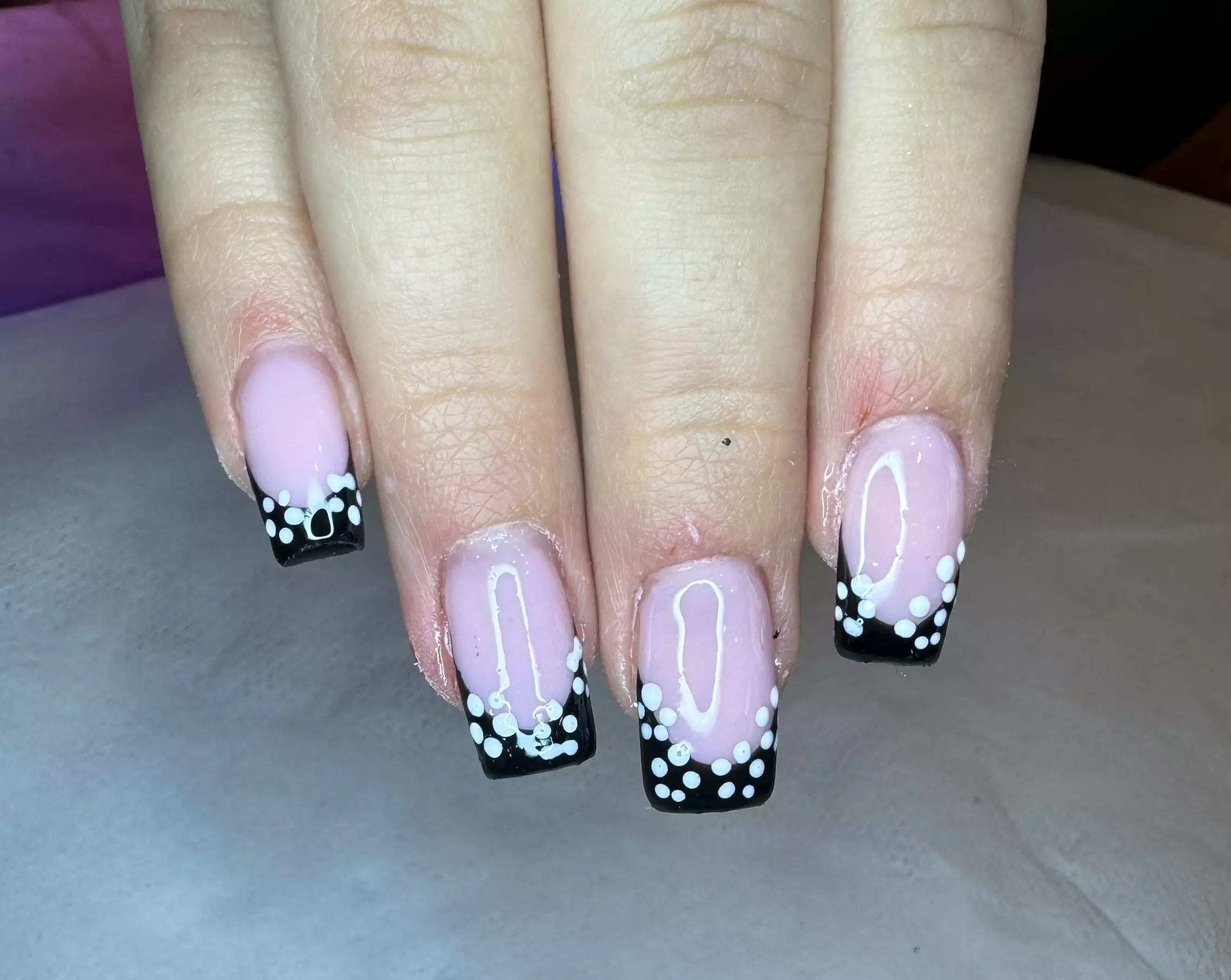 Experience top-notch nail care in a chic and inviting environment