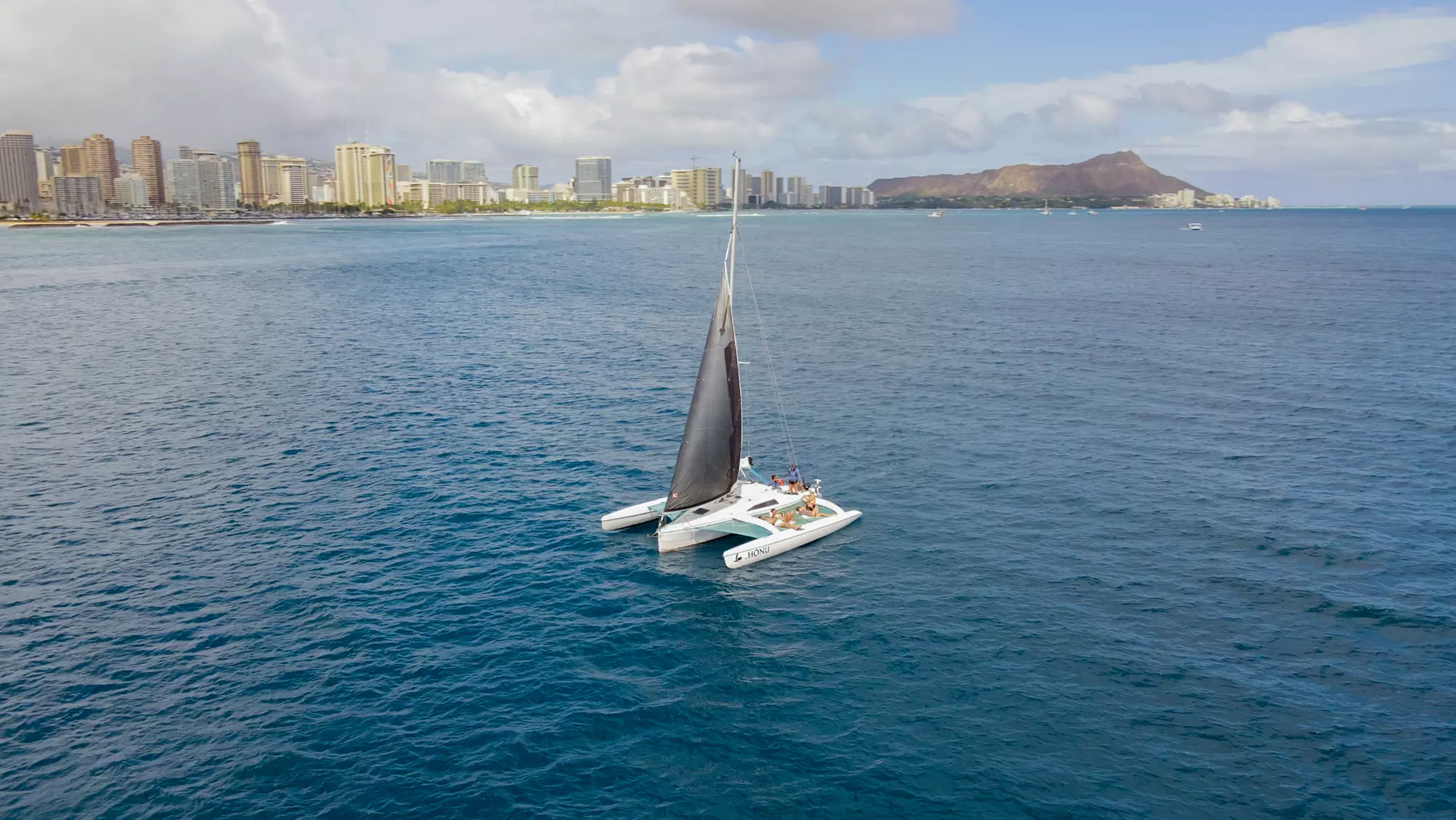 Sunset Sailing or Private Charters with Swim Stop in Honolulu, HI