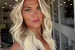 Classic Blowout or Blowout with Treatment Upgrade (Up to 50% Off) at The Doll House Salon - Second Medium
