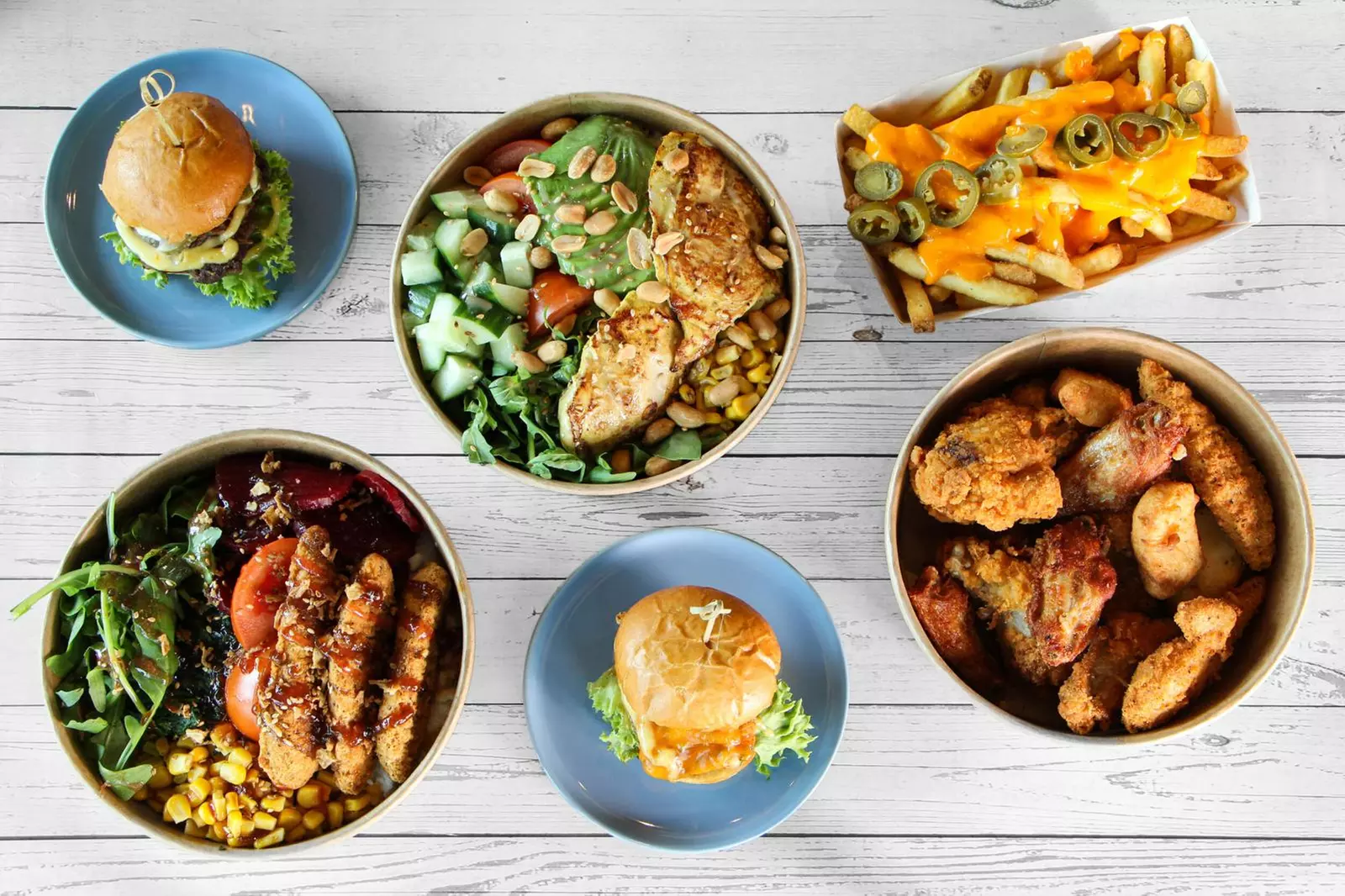 Burger-Genuss: Dream Burger inkl. Beilage nach Wahl für 1 - 4 Personen