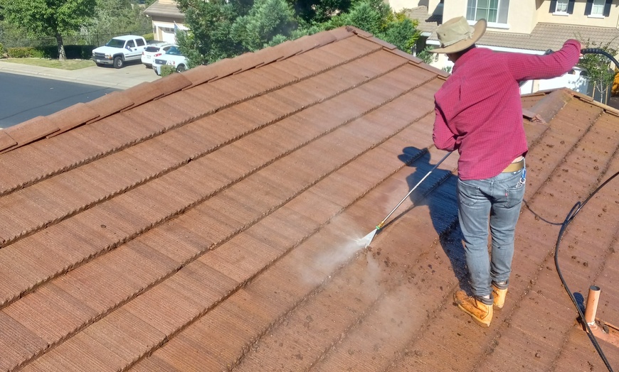 Image 1: Experience Bear Clean Service's roof washing for homes up to 2100 sq ft with a fantastic offer of up to 34% off