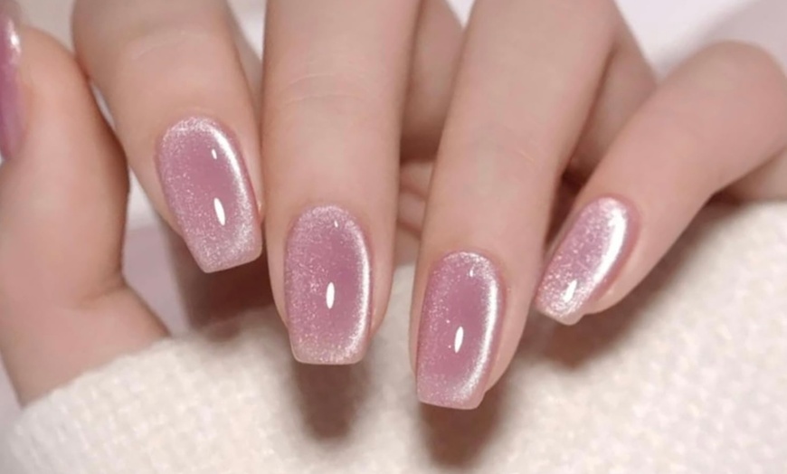 Image 1: Get Stunning Nails with Cat Eye or Mirror Chrome Gel Manicure or Pedicure at Ms Young (Up to 50% Off)