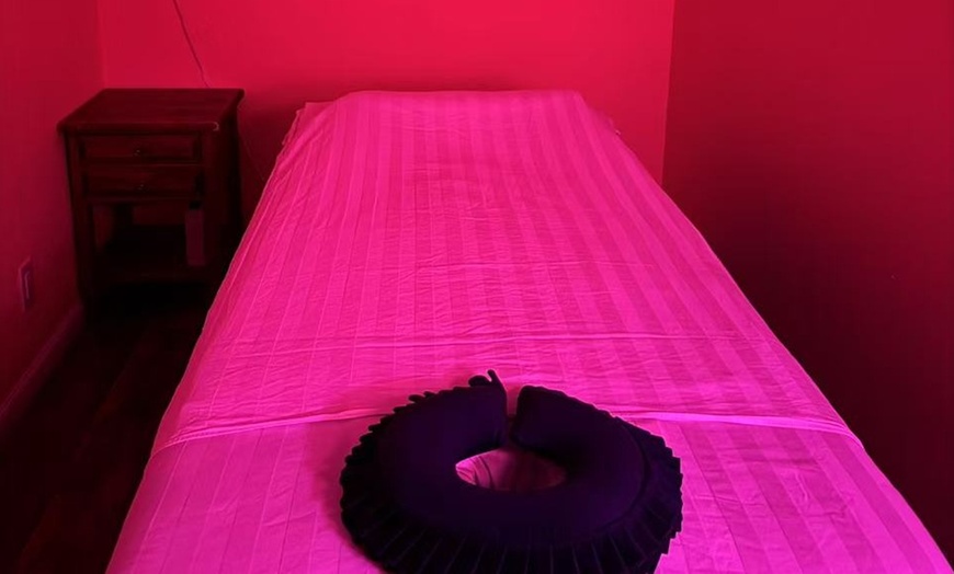 Image 4: Relax with 60-Minute Deluxe Body or Custom Combo Massage with Hot Stone & Optional Massage Oil (Up to 61% Off)