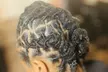 Revitalize with Retwist, Loc detox, Starter locs, and Free style at Melodic Roots & Wellness (Up to 48% Off) - Second Medium