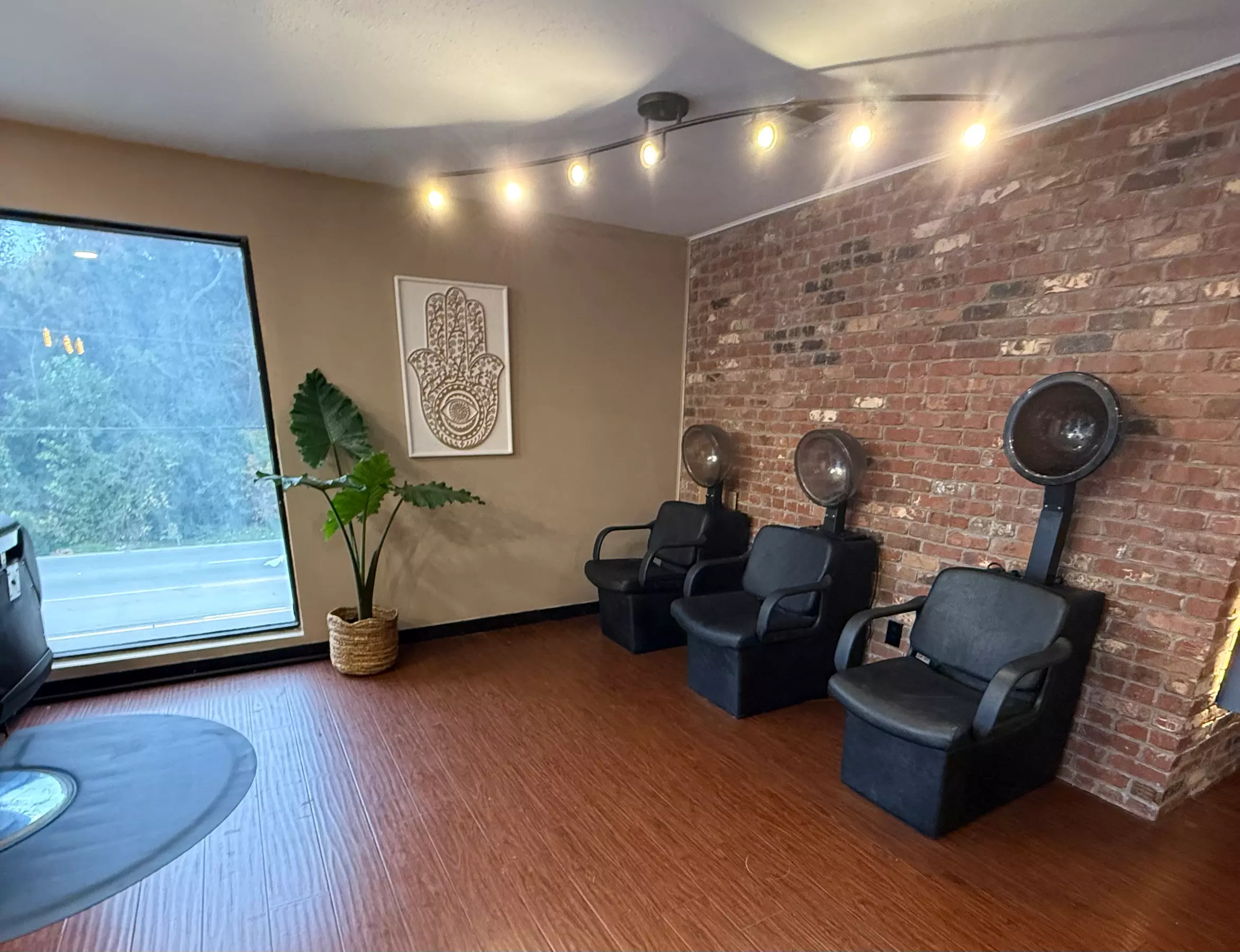 One Women's Haircut, Shampoo, Conditioning, Blow-Dry, Style and More