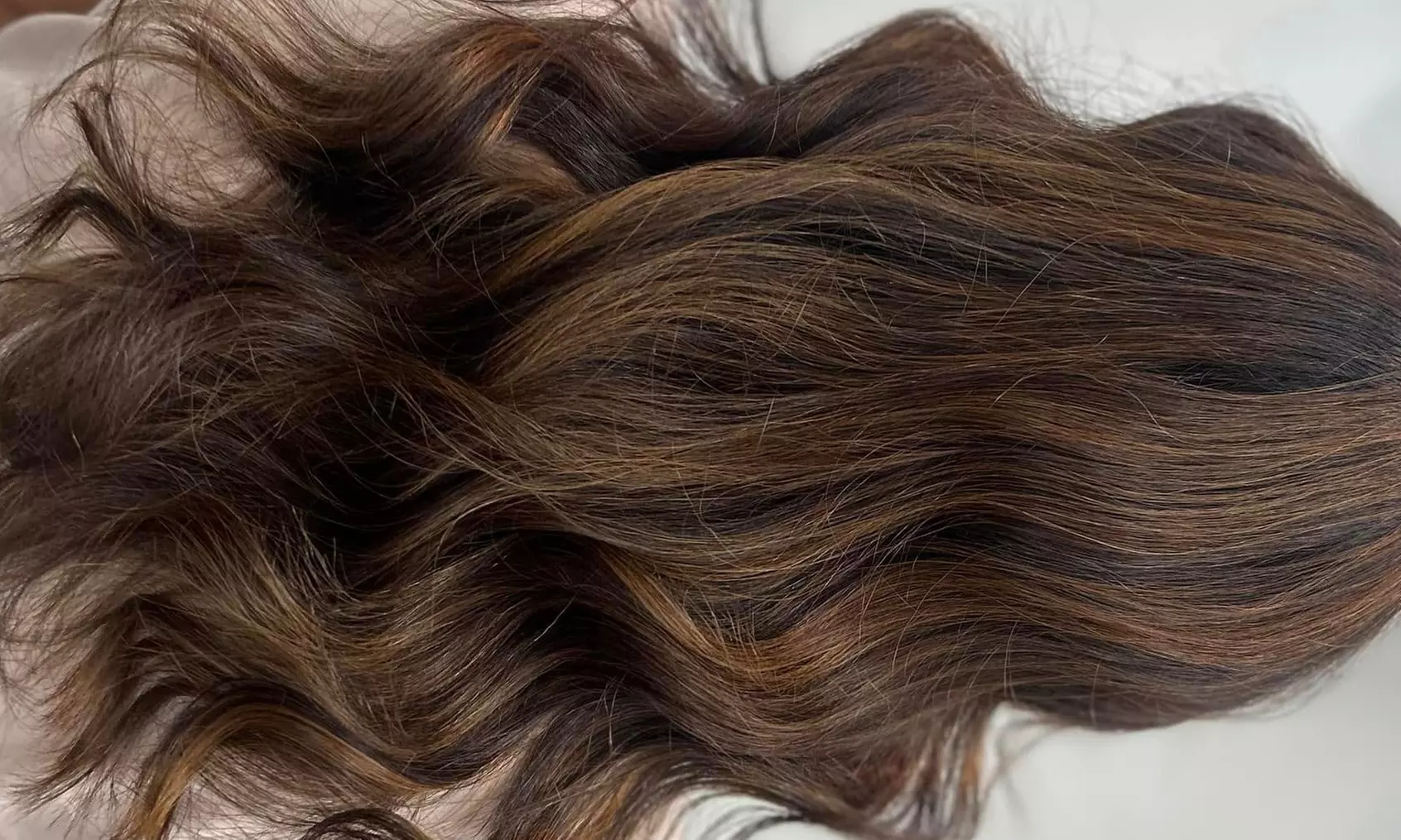 Haircut, Root Touch-Up, Men’s Haircut, and Half Highlights Packages