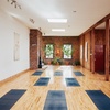 Image 2: Drop in for a Yoga Class with a Cozy Fireplace Setting at New Vibe Yoga (Up to 60% Off)