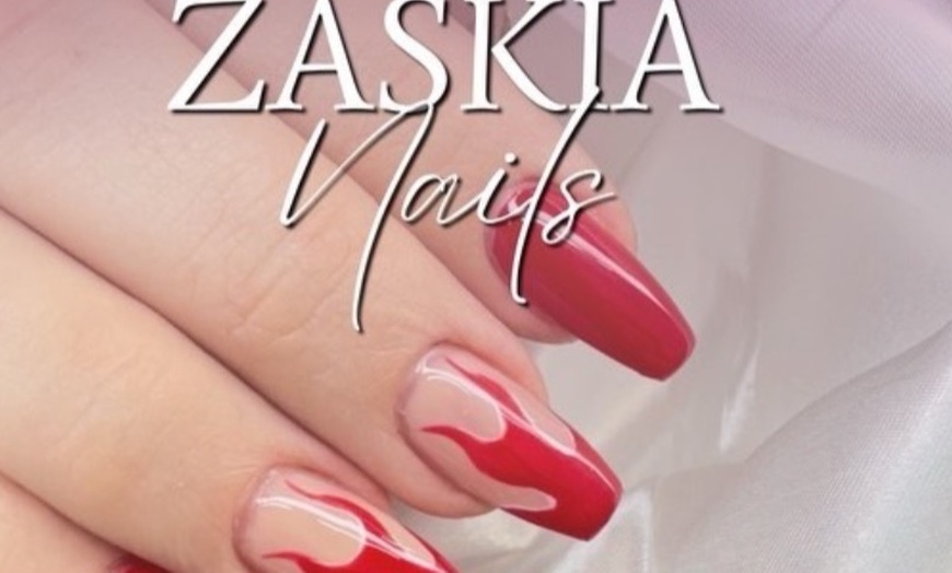 Image 1: Pamper yourself with 15-Minute Foot Massage with Any Nail Service