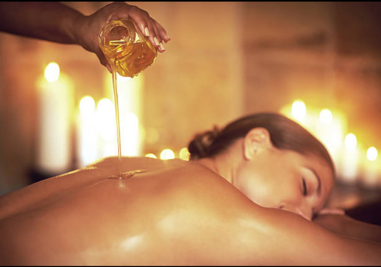 Massage à l'huile chaude de coco ou neutre avec Harmonie Intérieure