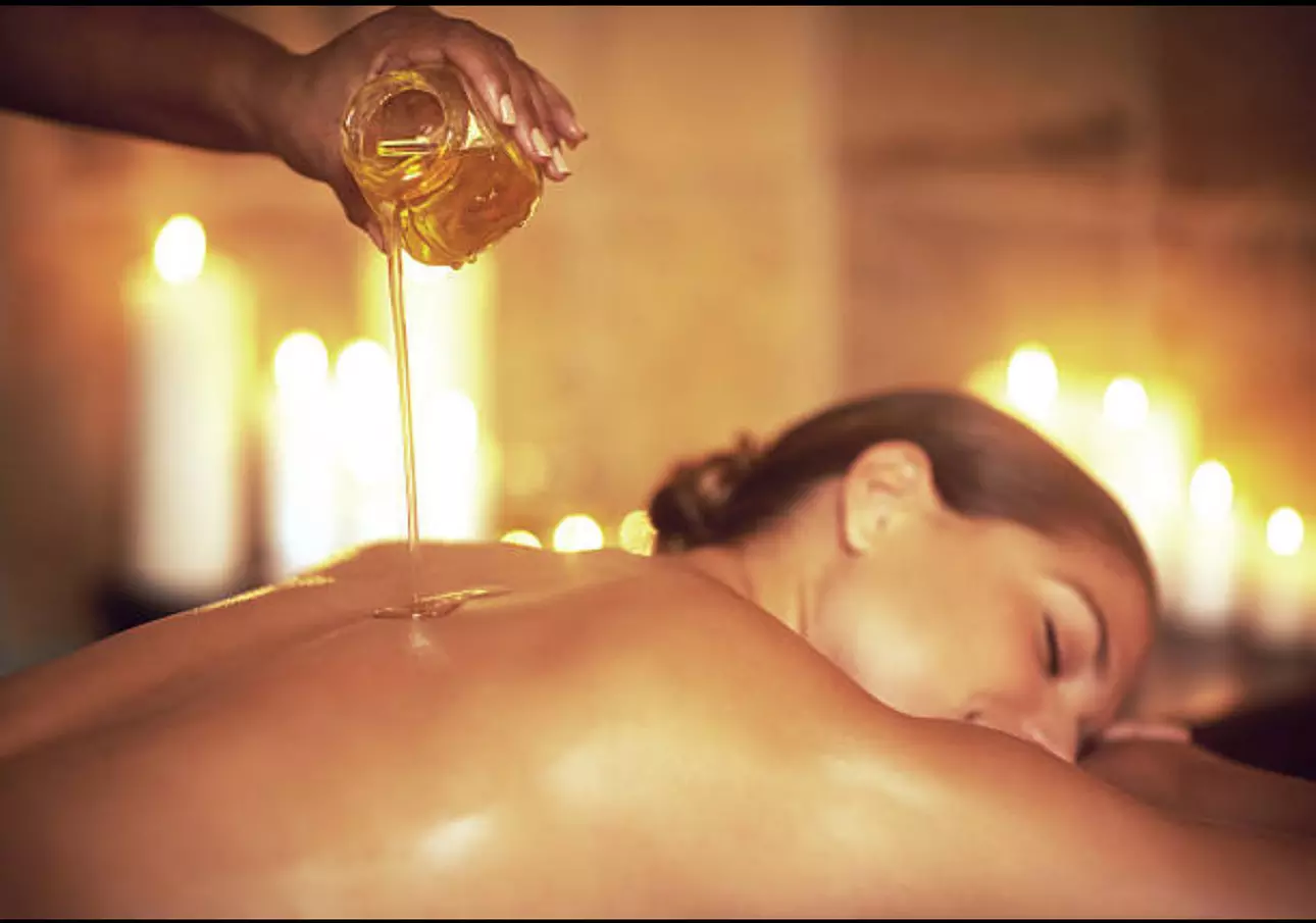 Massage à l'huile chaude de coco ou neutre avec Harmonie Intérieure