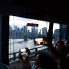 Image 8: NYC After Dark: 3-Hour/Half-Day Luxury Bus Tour for One, Two, or Three