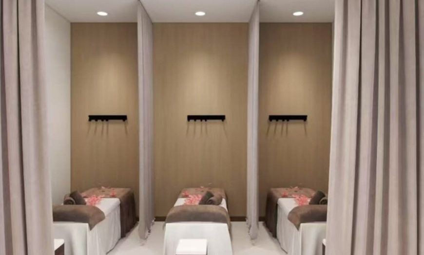 Image 2: Up to 55% Off on Couples Massage at Jingu Town Spa
