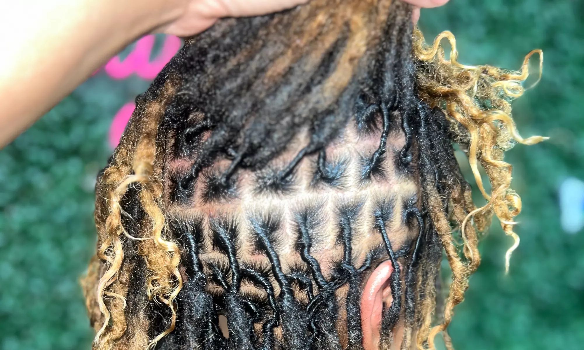 Revitalize with Retwist, Loc detox, Starter locs, and Free style at Melodic Roots & Wellness (Up to 48% Off) - Primary Image