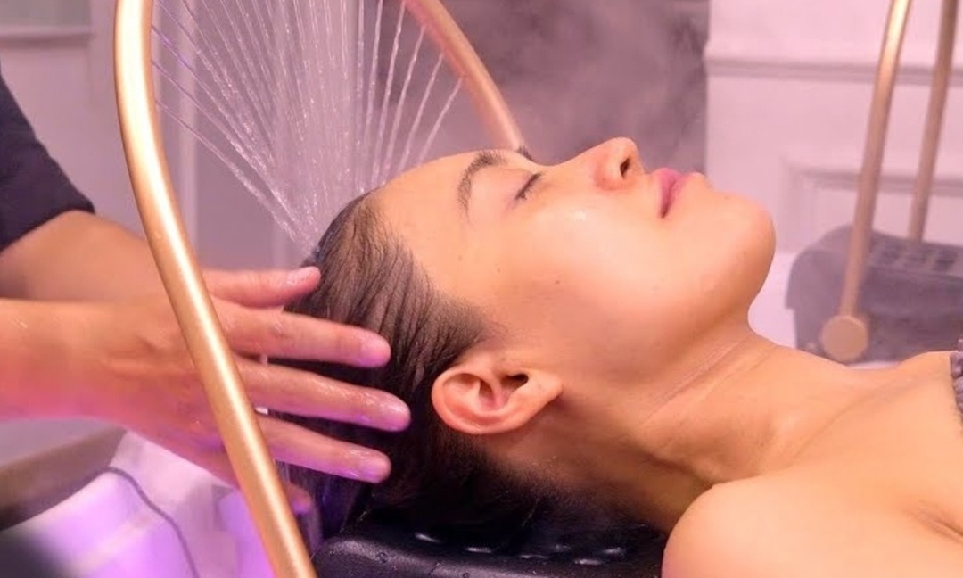 Revitalize with a 60-minute custom head scalp therapy session