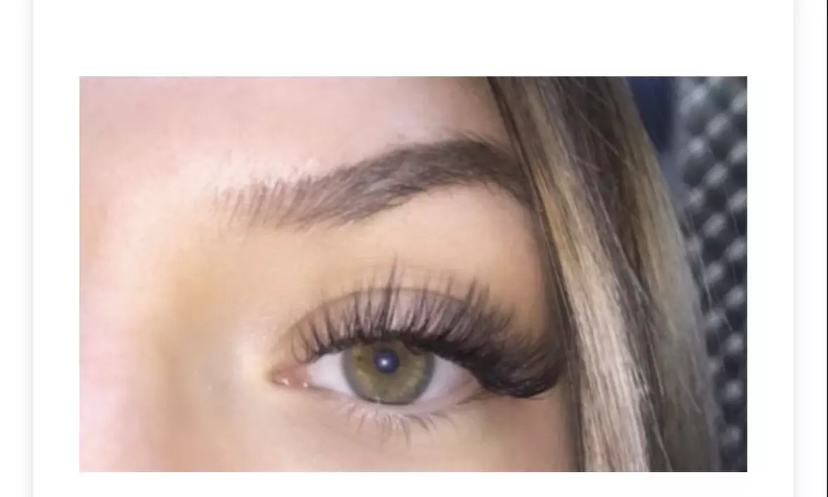 Full set of classic eyelash extensions for a natural look 