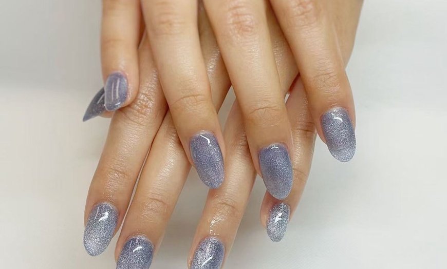 Image 1: Classic Gel Manicure with Stylish Custom Nail Art Design