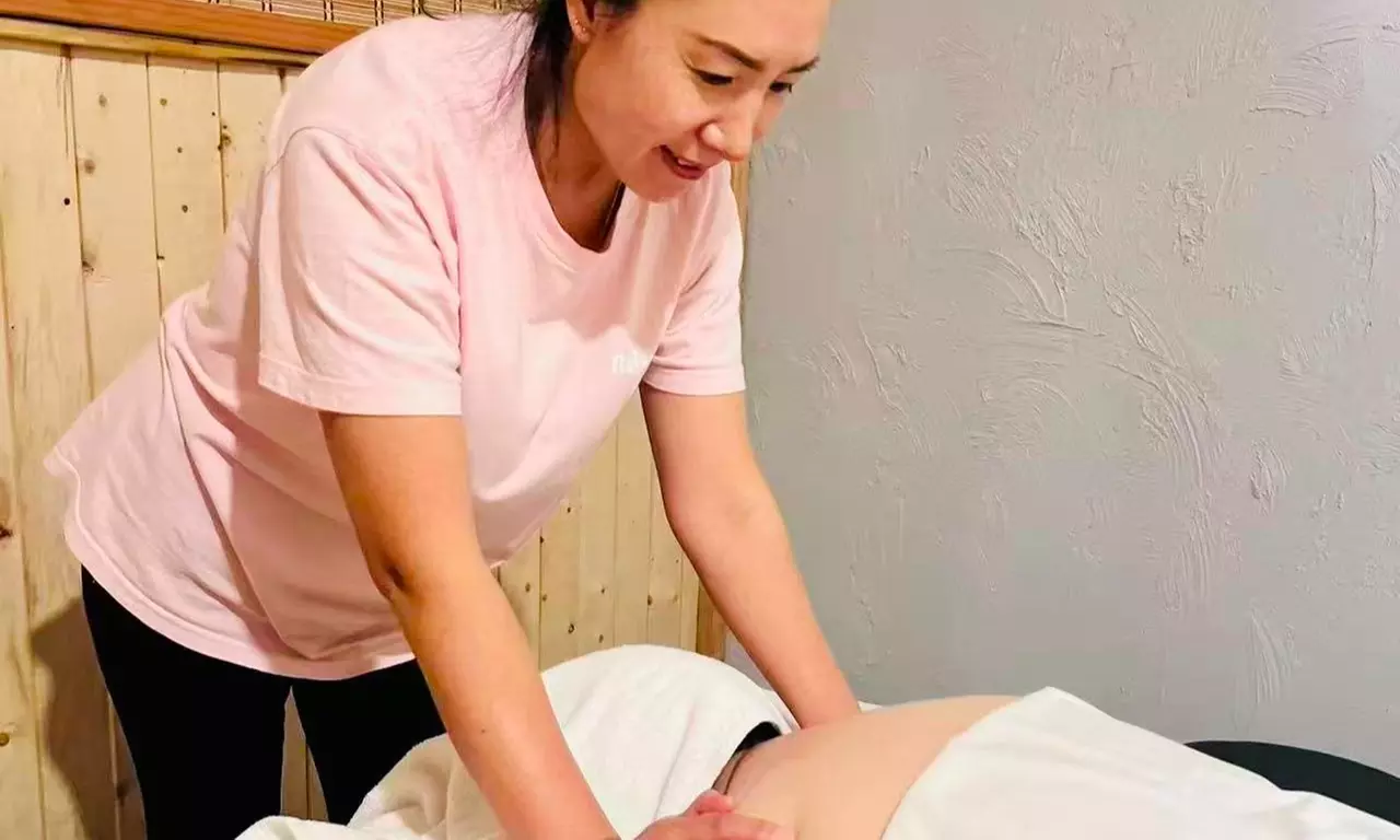 Relax with One 60 Minute Foot Massage Special or Deep Tissue Massage