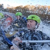 Image 1: Fun and Thrilling White Water Rafting Experience for One, Two, or Four