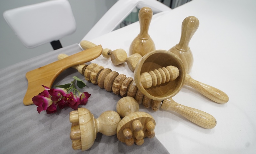 Image 1: Revitalize with 1, 3, or 5 Wood Therapy Sessions in One Area