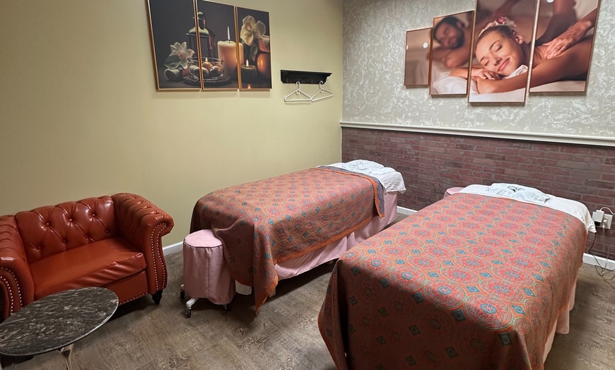 Image 4: Upgraded Full-Body Massage: Deep Tissue, Hot Stones & Essential Oils