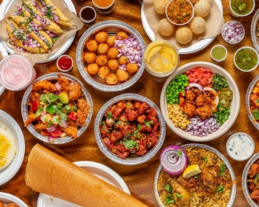 Two Starters with Four Main Dishes, Two Desserts and Four Drinks for Four People - Chopathi Tysons India Kitchen