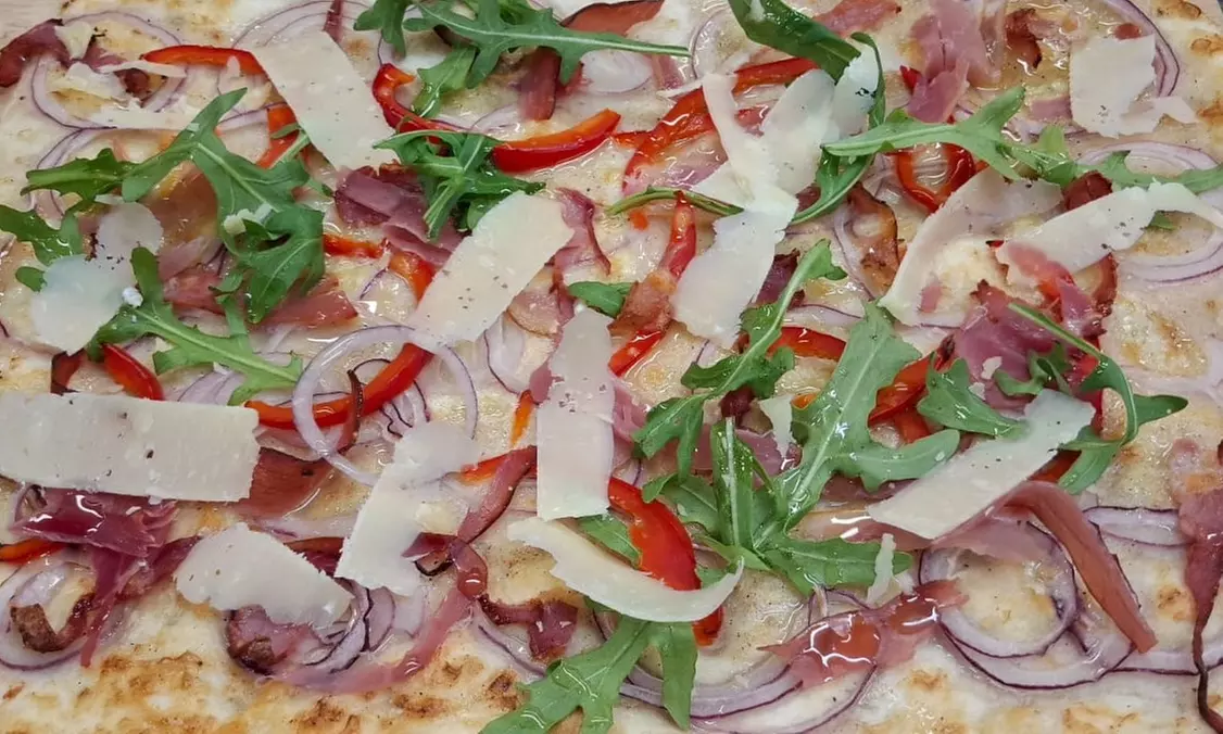 Enjoy a Flavor-Packed Flammkuchen Session for Four or Eight People