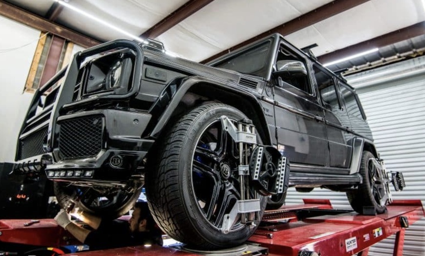 Image 3: High-Speed Tire Balancing with Expert Wheel Alignment 
