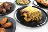 Dine-In Special: Starters, Chicken Entrees, & Drinks for Two or Four at Fire Side Kitchen + Bar (Up to 20% Off)