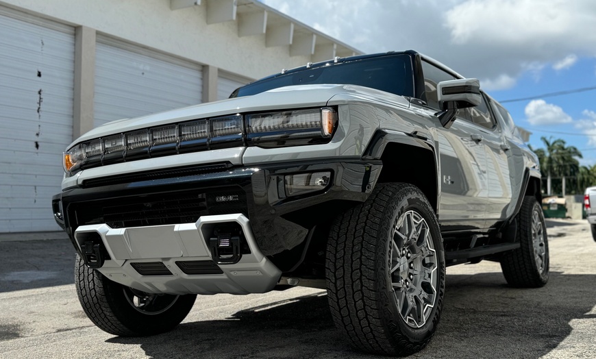 Image 1: Get Your Car Shiny With Aftercare Wash!