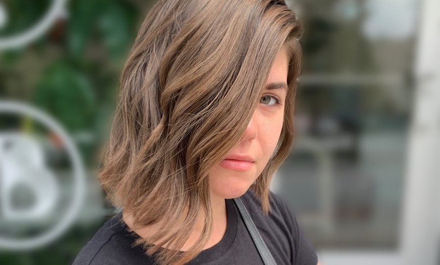Image 1: Revamp your appearance with a One Haircut with Shampoo and Styling 
