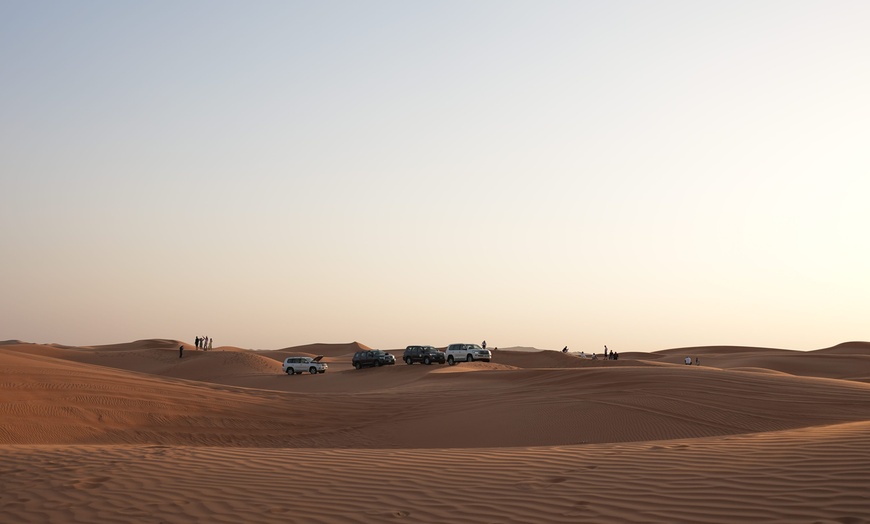 Image 1: Evening Desert Safari with Dinner: Home or Hotel Pick-up by 4x4 Car