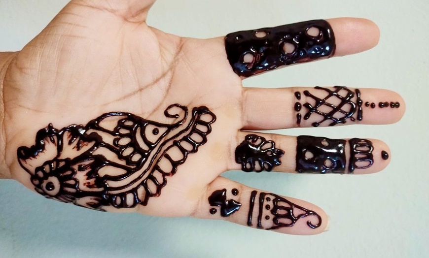 Image 14: Henna Hand for Cultural Elegance!