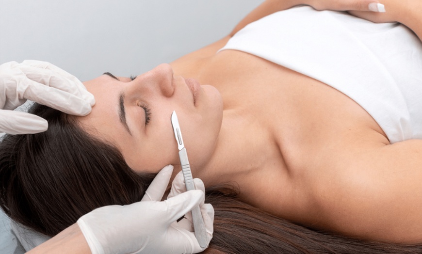 Image 1: Up to 25% Off on Dermaplane Facial at SKIN By Brown