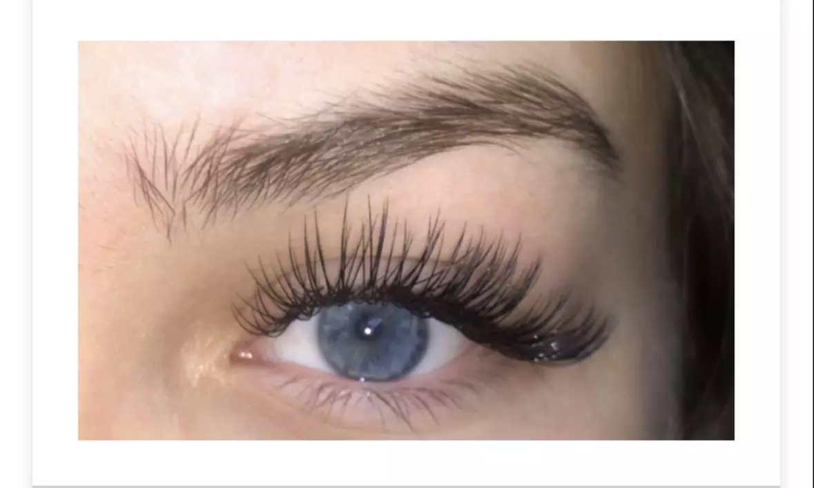 Full set of classic eyelash extensions for a natural look 