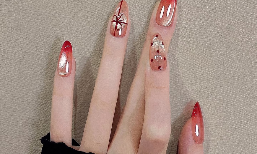 Image 6: Up to 46% Off on Salon-Shellac/No-Chip Mani-Pedi at Magic Beauty Wellness