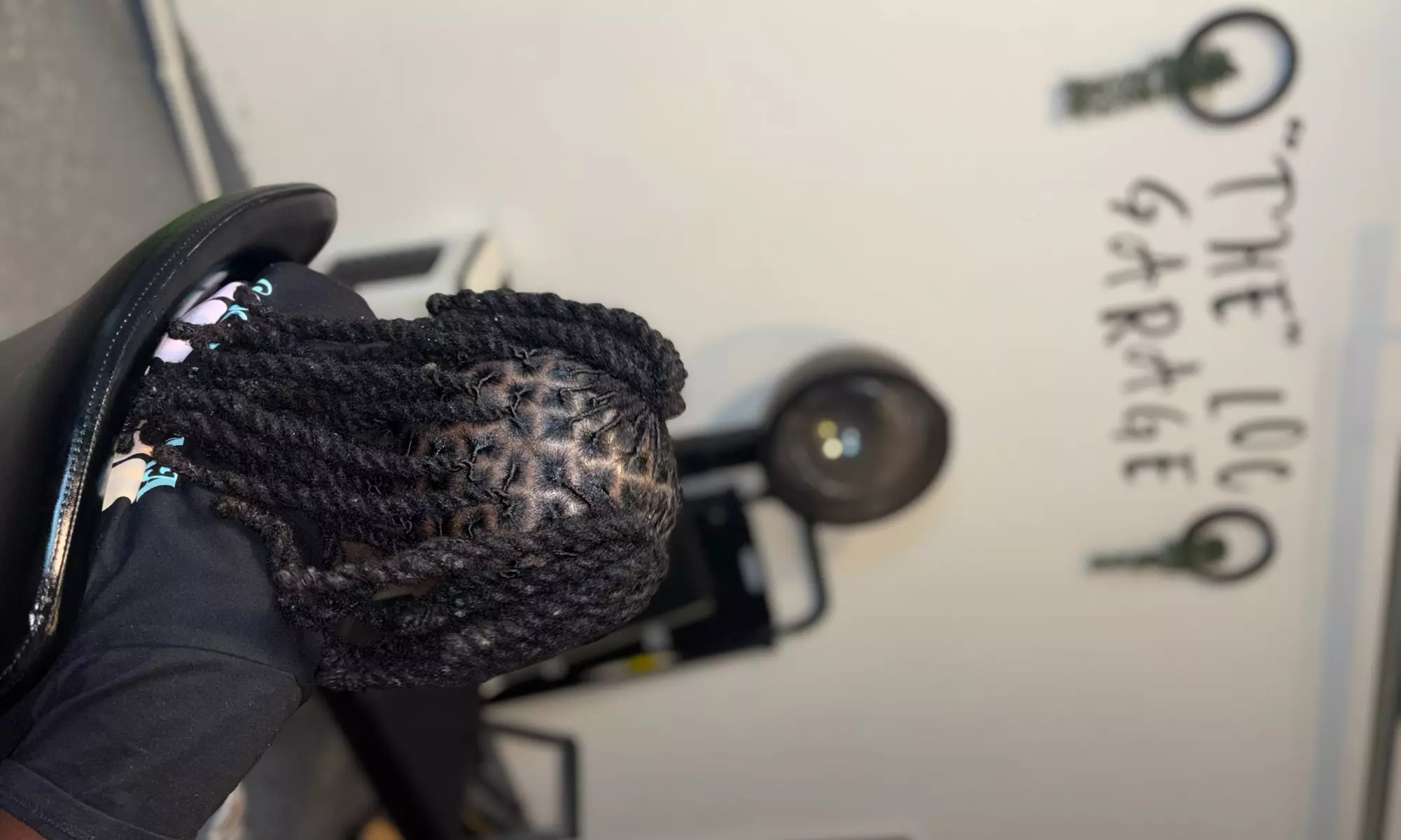 Shampoo Retwist + 2-Strand Twist, 2-Strand/Comb Coil Starter Locs or Shampoo+ Silk Press (Up to 56% Off) - Primary Image