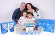 Get Family Holiday Photo Session + Retouched Portrait/Hairstyling/Make-Up @Glamour Shots (Up to79% Off) - Second Medium