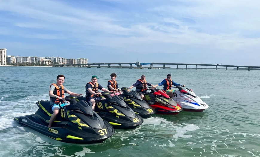 Image 3: Thrilling Jet Ski Rentals & Relaxing Beach Day Packages