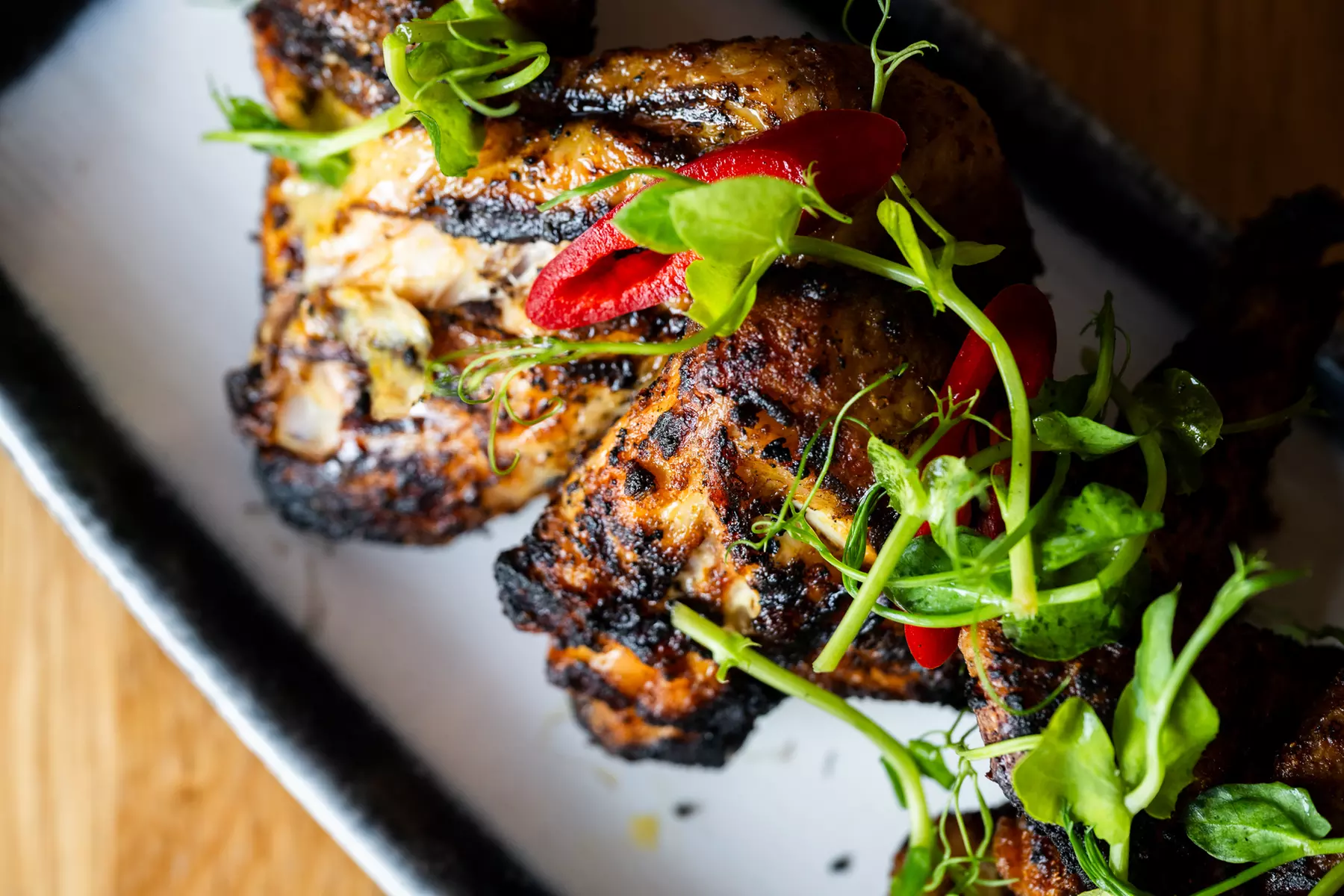 Treat Yourself to a 2-Course Meal with a Glass of Wine for Two or Four