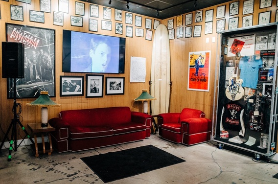 Interior of The Punk Rock Museum with various punk rock artifacts on display.