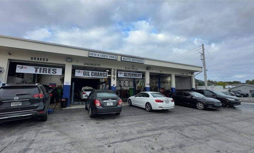 Image 1: Oil Change with Extras: Battery & Tire Check Combo