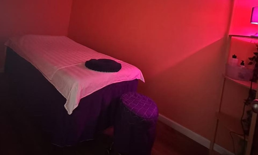 Image 2: Relax w/ a One 70-minute Deluxe Body Massage with Hot Stone Treatment