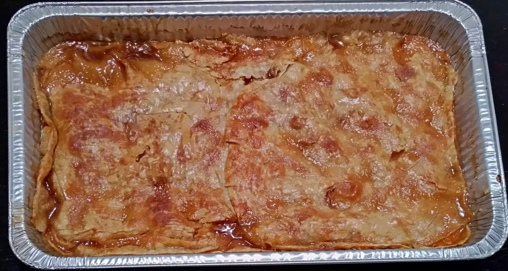 Enjoy a Delicious Peach Cobbler that Serves 40-50 People