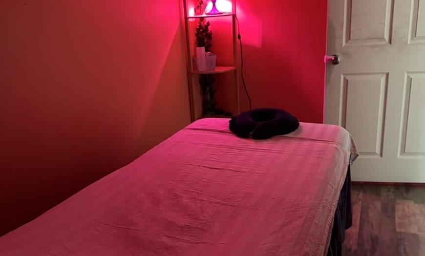 Image 5: Relax with 60-Minute Deluxe Body or Custom Combo Massage with Hot Stone & Optional Massage Oil (Up to 61% Off)