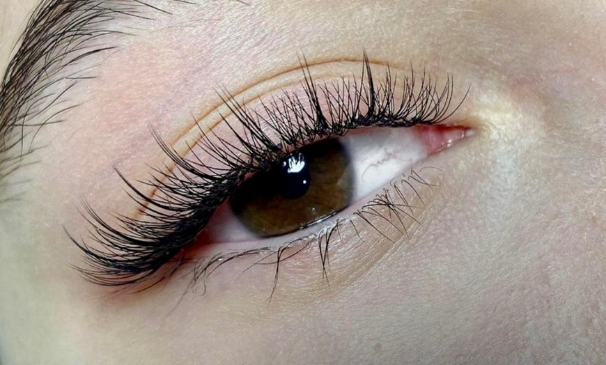Image 3: Achieve a voluminous look with Enigma Salon And Spa's full set of eyelash extensions, up to 49% off